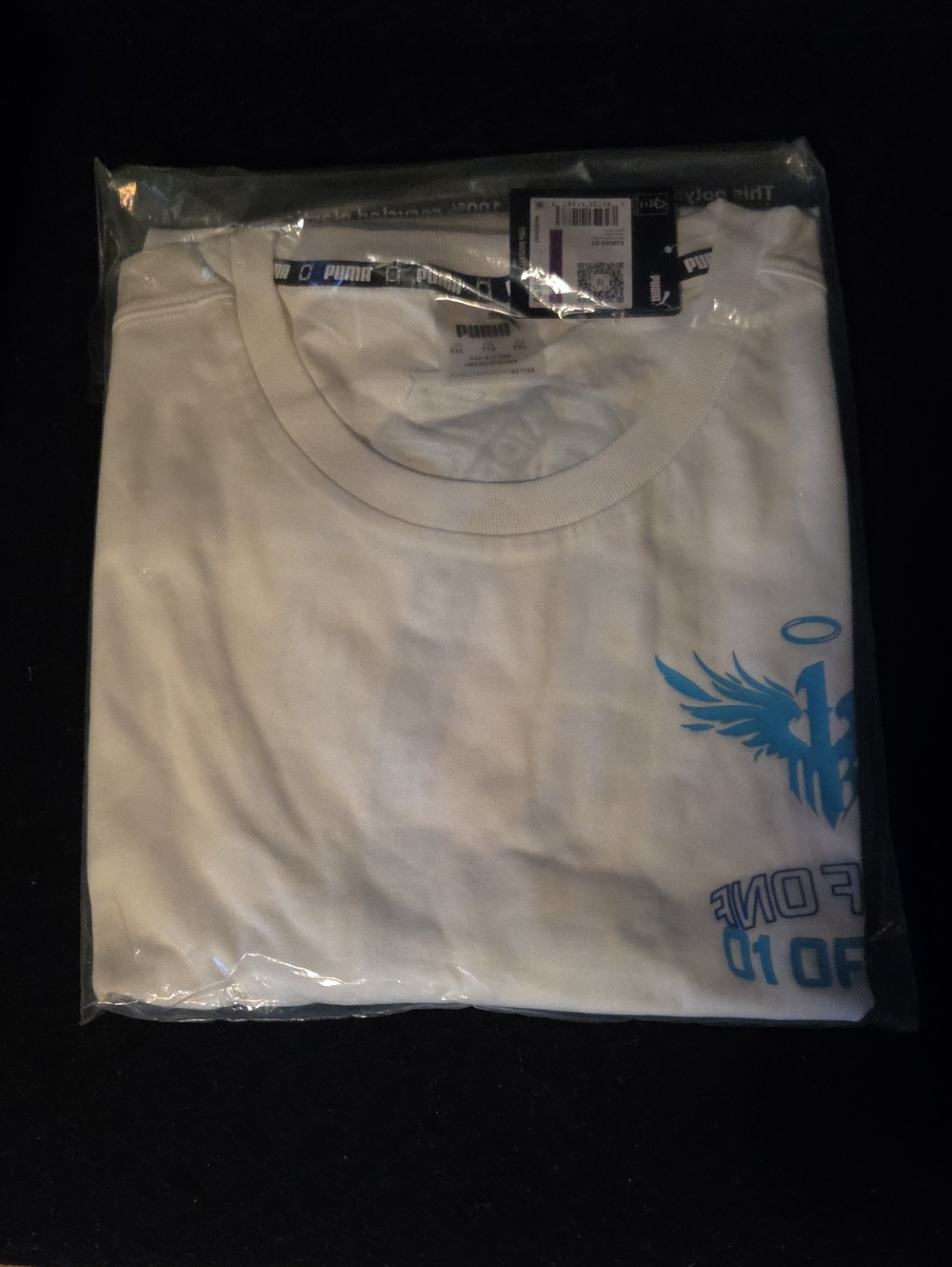 Puma White Short Sleeve Tee with Light Blue Graphic
